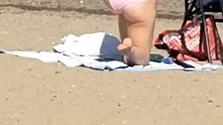 pink princess struts her stuff on sunny beach vibes