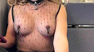 Sheer top flashing pierced nipples on crowded public train