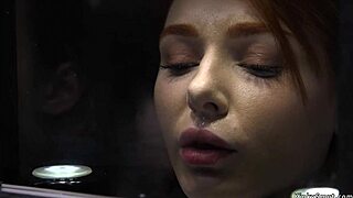 Redhead slave chokes on toys in tight bondage setup