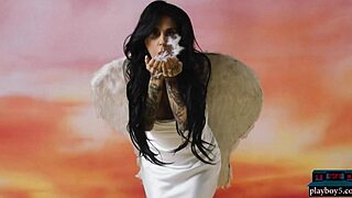 busty tattooed milf joanna angel strips her luscious body for playboy