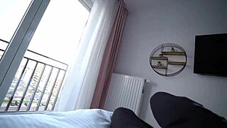 couple shares cozy bed in hotel room during getaway