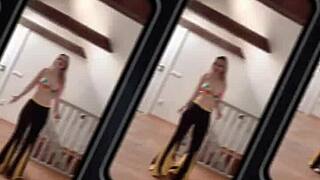 Belly dancer goddess sways her huge belly in seductive music rhythm