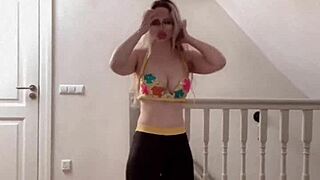 Belly dancer goddess sways her huge belly in seductive music rhythm