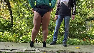 Chubby mature flashes short skirt teasing outdoor hairy pussy