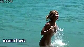 naomi takes hot cumshot right on the beach