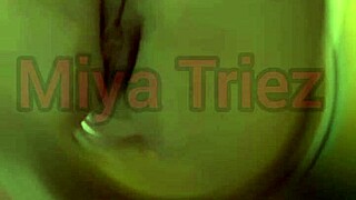 Miya Triez strips teasing her big ass and natural tits