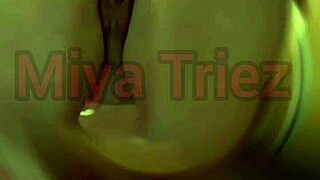 Miya Triez strips teasing her big ass and natural tits