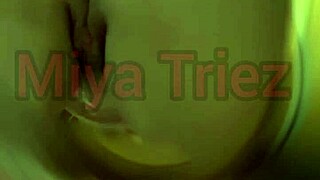 Miya Triez strips teasing her big ass and natural tits