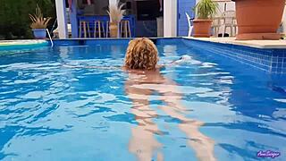 mature blonde couple enjoys poolside pussy play and sex