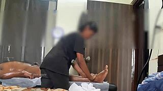 hidden cam catches masseuse stroking cock for happy ending release