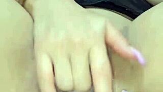 Hey, watch this hot redhead tease her big tits and ass anally