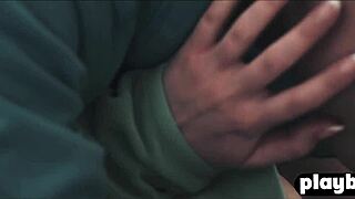 Sensual couple shares intimate winter day embrace in snow