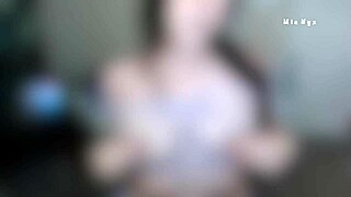 mia nyx teases her pink hairy pussy through see-through lingerie before stripping