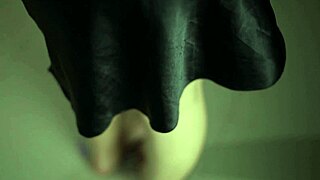 Curvy indian beauty teases in black satin dress