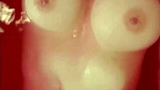 i'm so horny watching this busty babe rub her huge tits in the tub... oops spilled