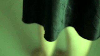 Curvy indian beauty teases in black satin dress