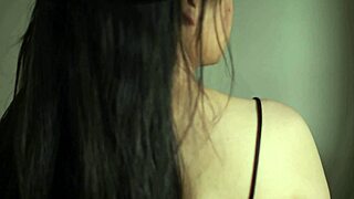 Curvy indian beauty teases in black satin dress