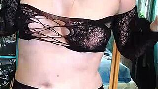 Blonde beauty tries new outfit in bedroom softly