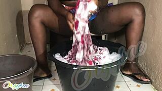 Housewife Handles Weekend Laundry with Shaved Pussy Tease