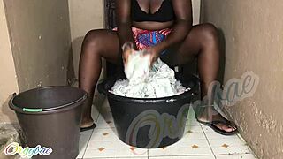Housewife Handles Weekend Laundry with Shaved Pussy Tease