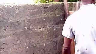 escort de rose demonstrates prostate pee technique outdoors