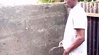 escort de rose demonstrates prostate pee technique outdoors