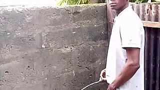 escort de rose demonstrates prostate pee technique outdoors