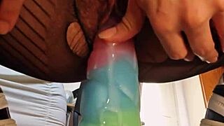 bad dragon dildo stretches wet hairy pussy close up