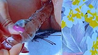 brunette latina teen shoves glass dildo in shaved pink pussy post beach orgasm play