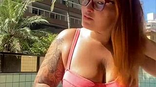 Redhead's swollen pussy flashes live exhibitionist style