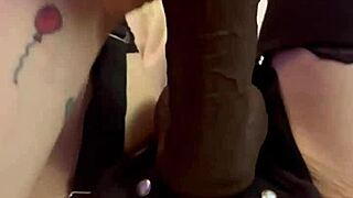 narrates huge strap-on cock teasing close-up with tattooed amateur