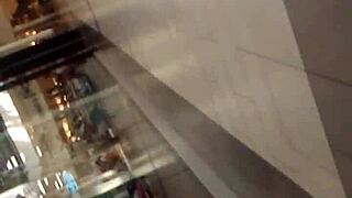 Voyeur Captures Ebony Ass Folding in Hidden Shop Candid Glory