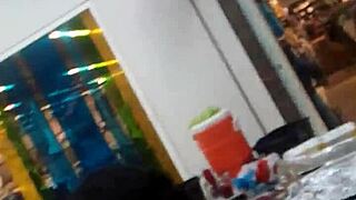 Voyeur Captures Ebony Ass Folding in Hidden Shop Candid Glory