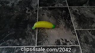 Sexy Barefoot Femdom Tramples Sub with Banana Toy Fetish