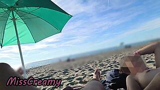 french teacher flashes wet pussy on nudist beach, masturbates till squirt caught