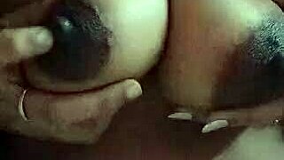 desi indian wife squeezes her big lactating milk boobs