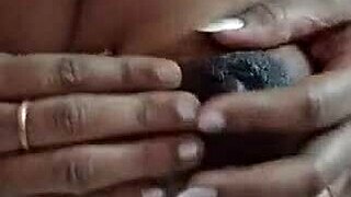 desi indian wife squeezes her big lactating milk boobs