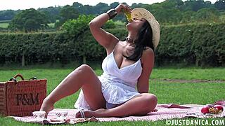 Donna Ambrose's ecstatic picnic wank surges to blissful orgasm