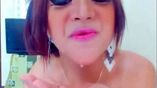 Tranny slurps her huge dick hungrily 😈