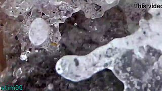 She stuffs stones in ass and pussy on nudist beach