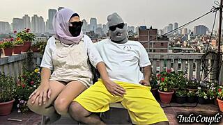 Balcony beauty begs for hairy pussy touch outdoors