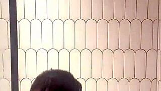 Steamy shower oiling highlights every glistening curve