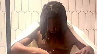 Steamy shower oiling highlights every glistening curve