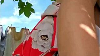 hairy mature milf flashes natural tits while masturbating outdoors