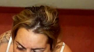 Tattooed girlfriend deepthroats and swallows cum with sloppy licking sounds