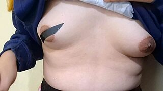 Blonde sissy slaps milky nipples with huge dildo punishing herself