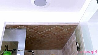 Elegant Brunette Enjoys Steamy Shower in Luxurious Bathroom Setting