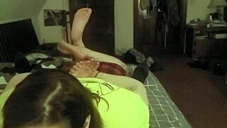 Redhead slave lays prone deepthroating master's cock