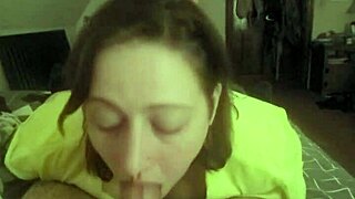 Redhead slave lays prone deepthroating master's cock