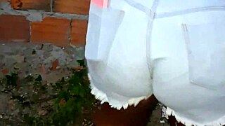 Curvy Neighbor's Huge Ass Shakes While Cleaning Yard in Homemade Tease